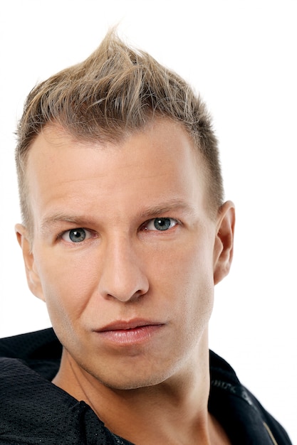 Free photo adult man with a shirt posing in studio