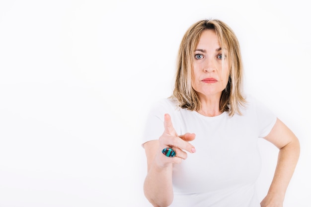 Adult woman pointing at camera