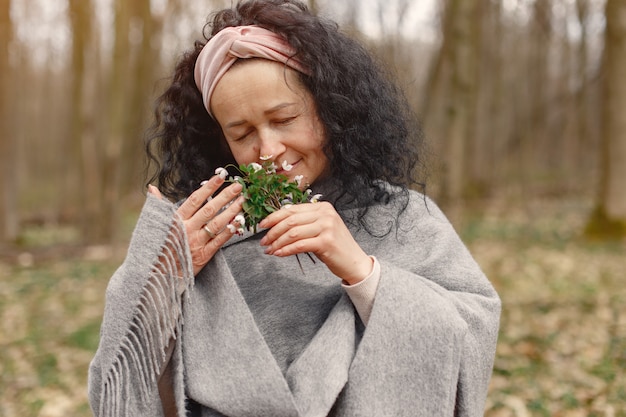 Free Photo adult woman in a spring forest