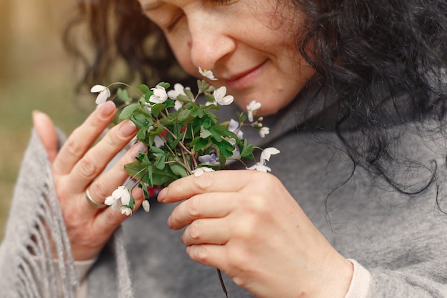 Free Photo adult woman in a spring forest