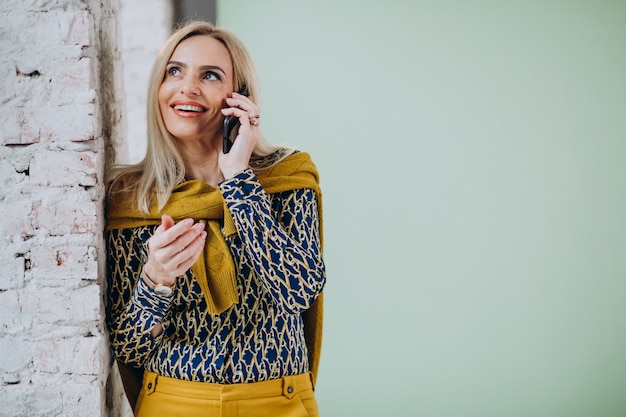 Free photo adult woman talking on the phone