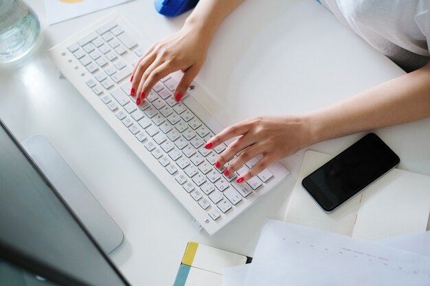 Adult woman working at office