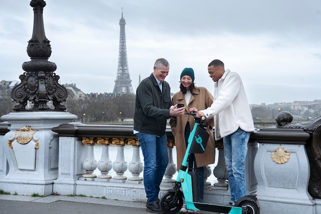 Adults learning to use electric scooter