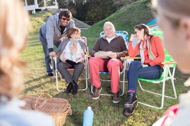 Adults talking on the meadow