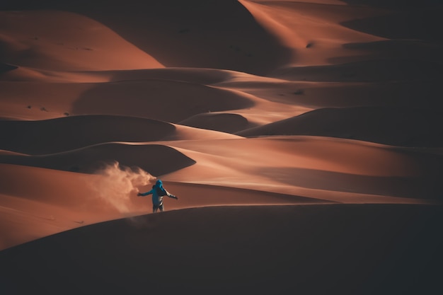 Adventurous young man in a desert