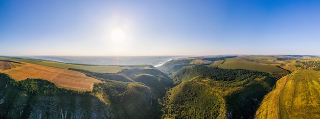 Aerial drone panorama view of nature in Moldova. Valley, river, wide fields