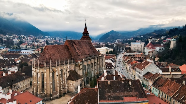 Aerial drone view of The Black Church in Brasov winter Romania