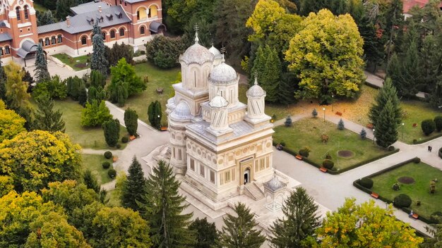 Aerial drone view of The Cathedral of Curtea de Arges Romania Episcopal Church square