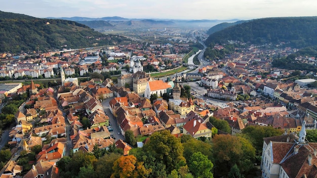 Free photo aerial drone view of the historic centre of sighisoara, romania