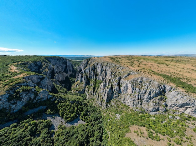 Aerial drone view of a rocky canyon in Romania