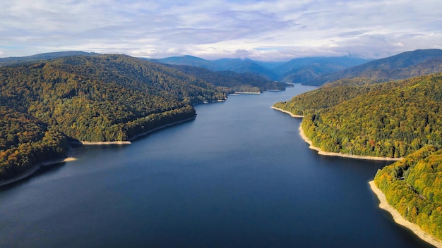 Free photo aerial drone view of vidraru lake in romania