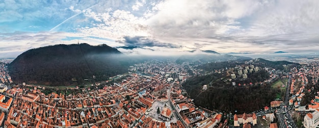 Free photo aerial drone wide view of brasov in winter romania