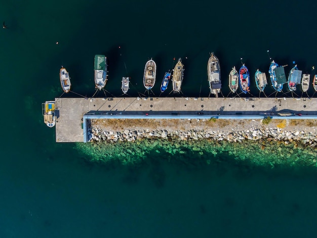 Free Photo aerial grayscale of ships on harbor