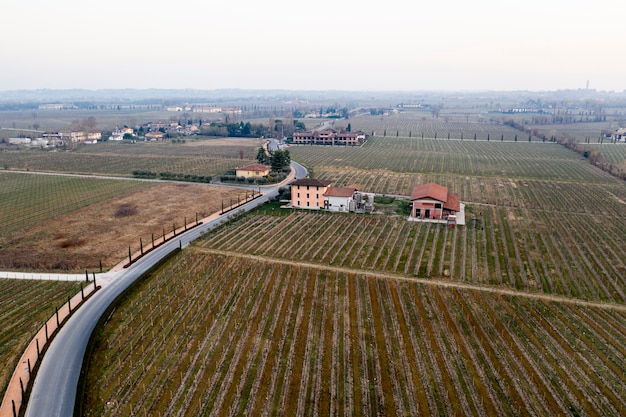 Free photo aerial panoramic landscape view of a road from a village