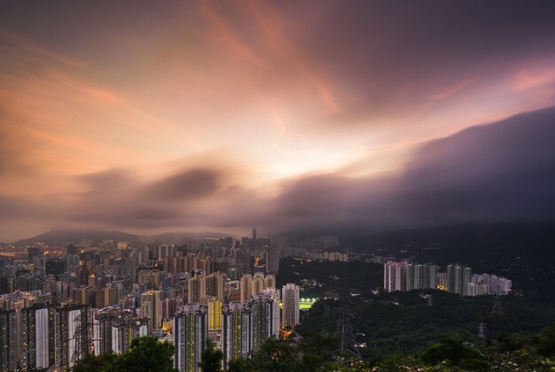 Aerial shot of beautiful modern urban city architecture and skyline with amazing sky