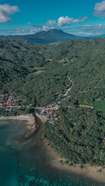 Free photo aerial shot of a beautiful seashore village in the philippines