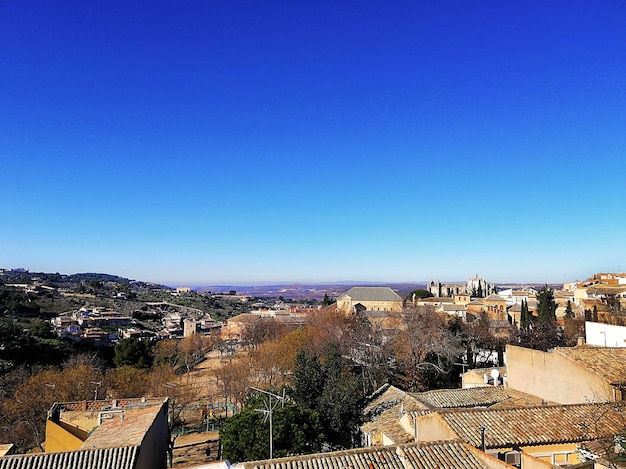 Aerial shot of the city and hill in Toledo, Spain