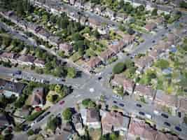 Free photo aerial shot of a cityscape, a central intersection with traffic