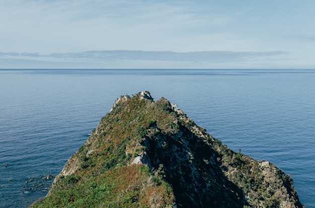 Aerial shot of Ermita de La Regalina in Asturias Spain - perfect for background