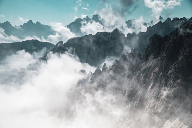 Aerial shot of mountains in fog