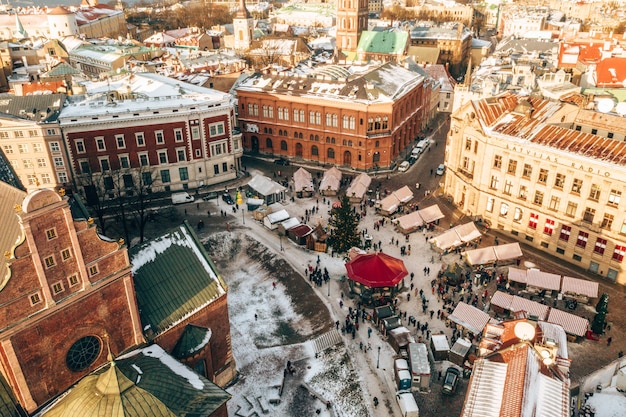 Free photo aerial shot of riga's cityscape during winter in latvia