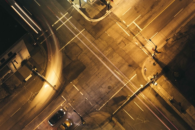 Free photo aerial shot of urban city highway at night