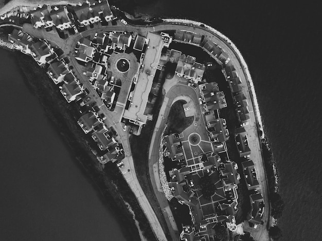 Aerial shot of an urban island in black and white