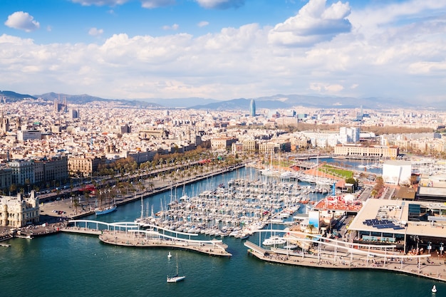 Aerial view of Barcelona city with Port Vell