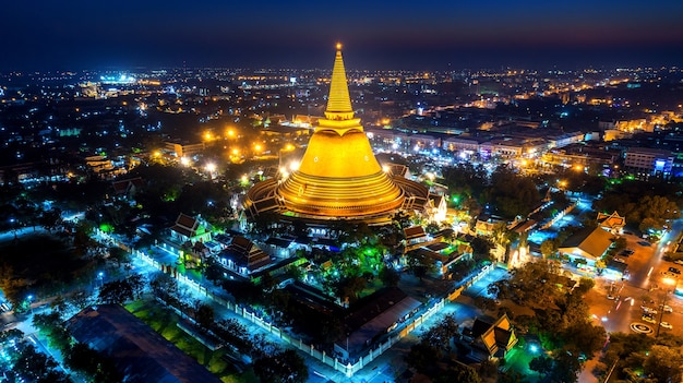 Aerial view of Beautiful Gloden pagoda at night. Phra Pathom Chedi temple in Nakhon Pathom Province, Thailand.