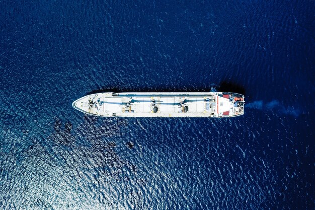 Aerial view of a blue sea and a boat