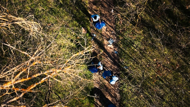 Free Photo aerial view of campaigners joining forces to recycle and tidy up garbage