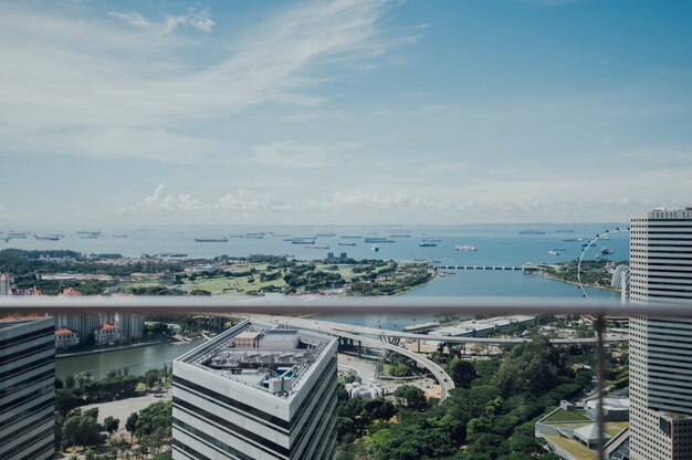 Aerial view of a city with the sea