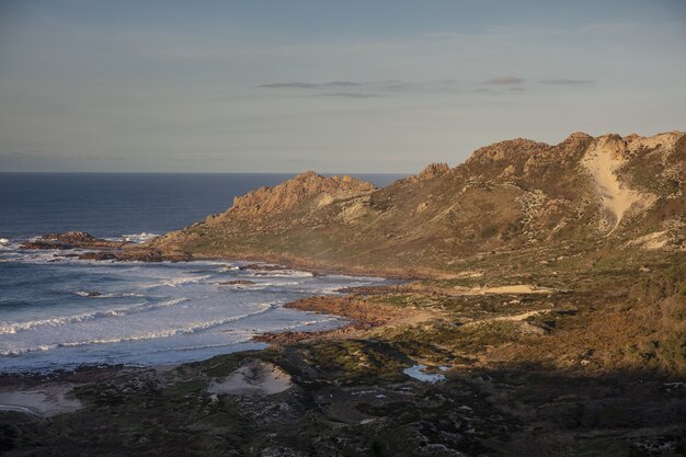 Aerial view of Death Coast at Galicia, Spain under bright sky