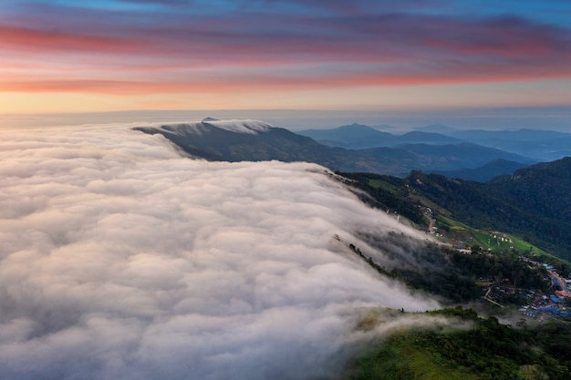 Free photo aerial view of fog over mountains in morning