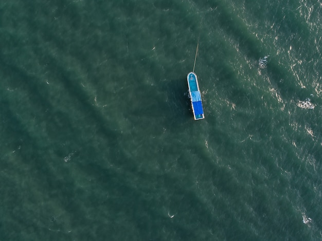 Free Photo aerial view of  holiday boat on blue ocean