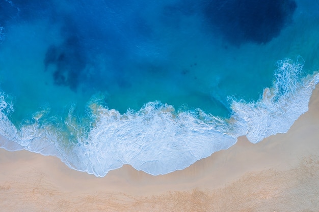 Aerial view of Kelingking Beach in Nusa Penida island, Bali in Indonesia