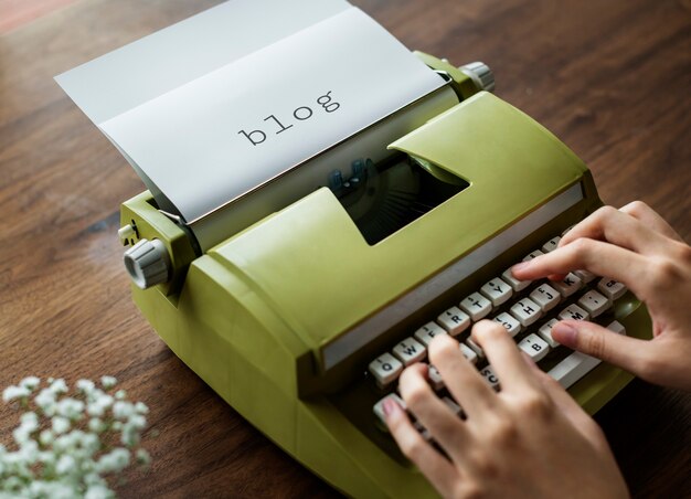 Aerial view of a man typing on a retro typewriter