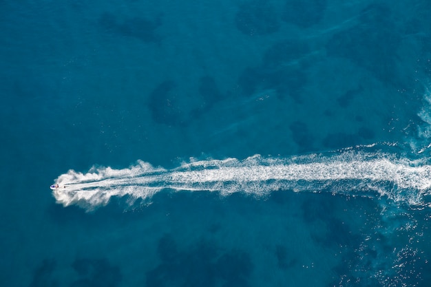 Free Photo aerial view of person with jetski