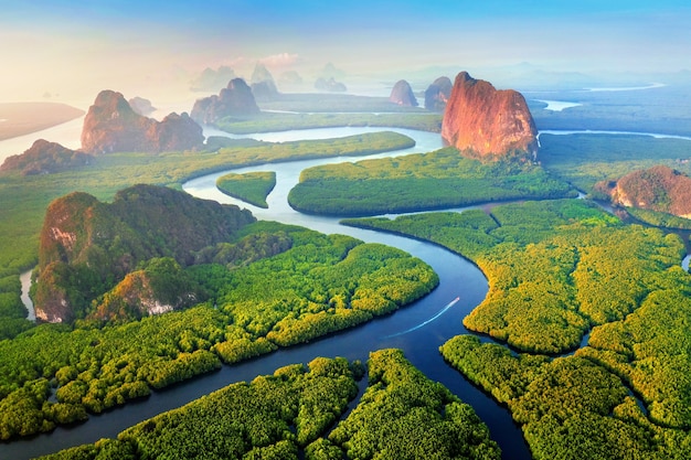 Free Photo aerial view of phang nga bay with mountains at sunrise in thailand.