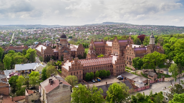 Free photo aerial view of residence of bukovinian and dalmatian metropolitans. chernivtsi national university. chernivtsi touristic destination of western ukraine.