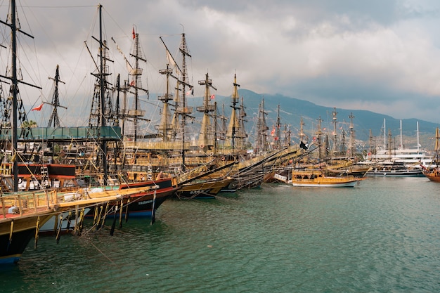 Free Photo aerial view of sailboats in mediterranean seashore bay