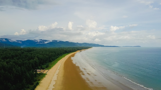 Aerial view of sandy beach with tourists swimming in beautiful clear sea water of the Sumilon island beach landing near Oslob, Cebu, Philippines. - Boost up color Processing.