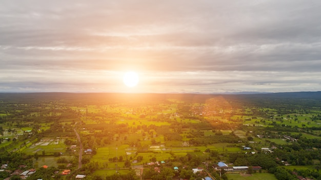 Free photo aerial view over small village, country roadside.