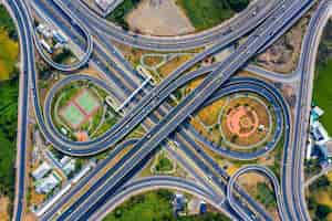 Free photo aerial view of traffic on massive highway intersection.