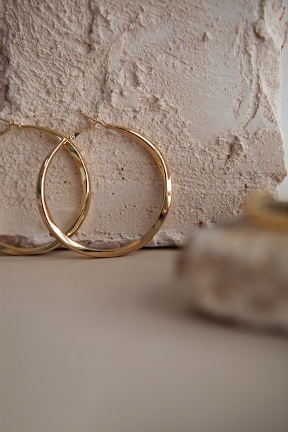 Free photo aesthetic golden earrings assortment