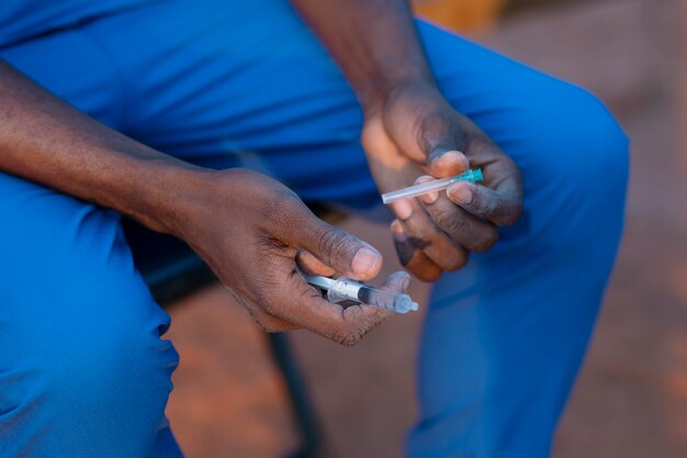 Africa humanitarian aid doctor getting ready for work