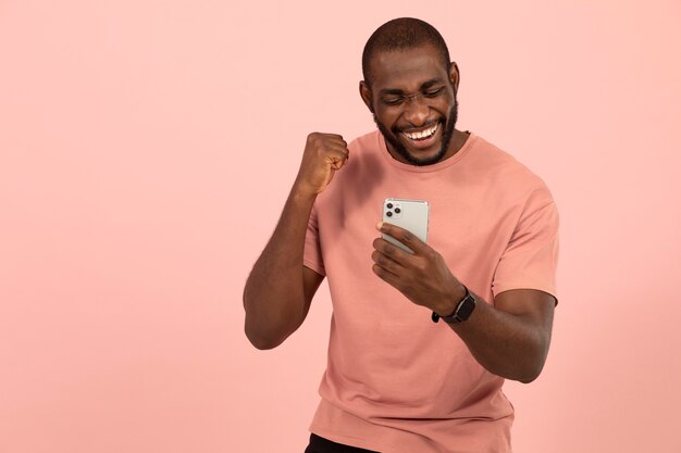 African american man checking his smartphone