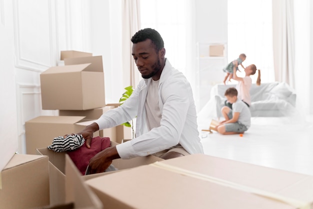 African american man getting ready his new home to move in