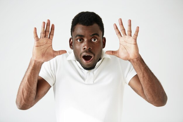 African-American man wearing white T-shirt