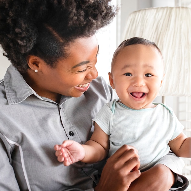 African American mother looking at her son smiling